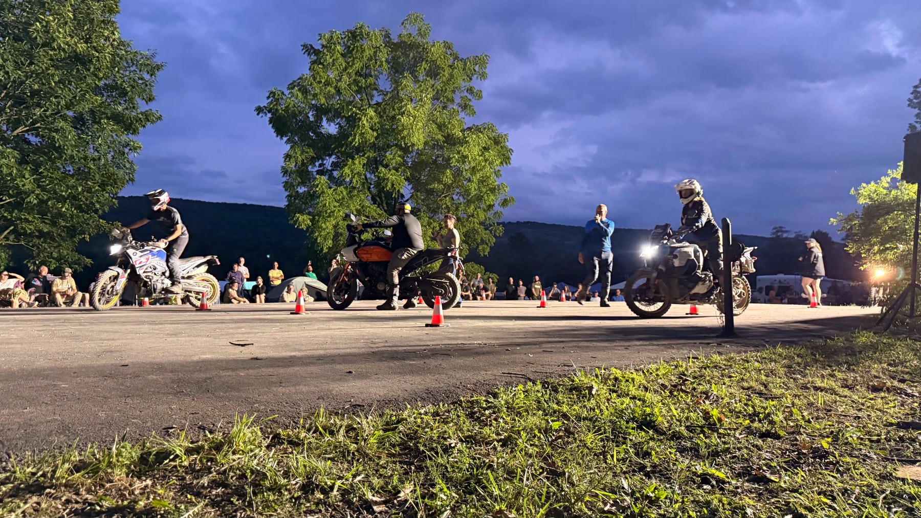 Slow races after sunset: balance, laughter, and a crowd willing everyone to stay upright.