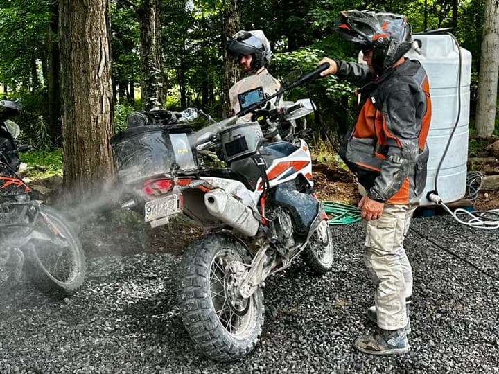 A trailside wash-down before the next stretch.