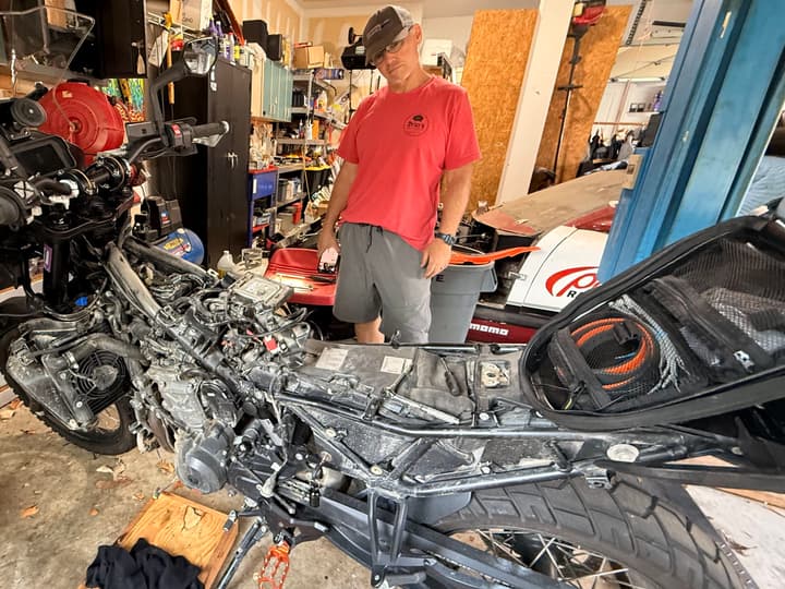 The adventure began in the garage: tools out, bodywork off, and every detail checked.